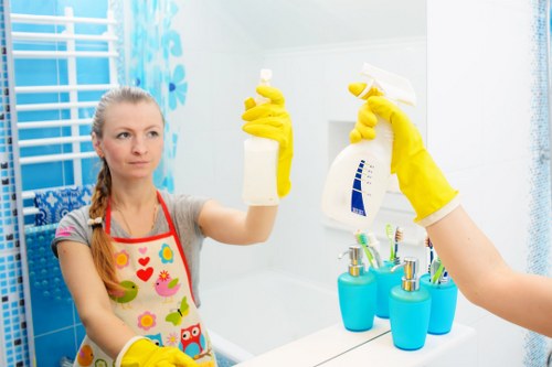 Carpet cleaning team using safe working practices with equipment inspection